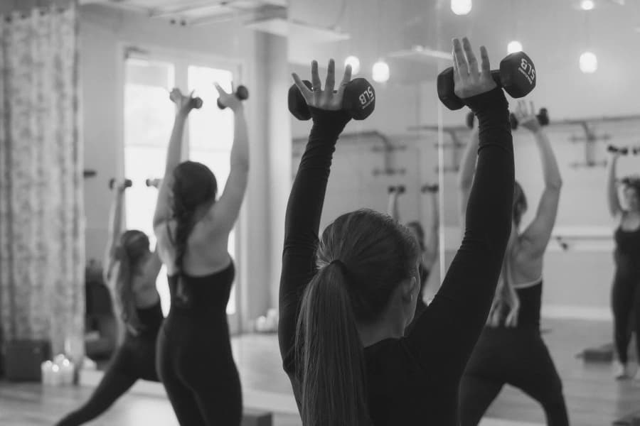 MYST 30A Yoga studio with students practicing in a bright, spacious room