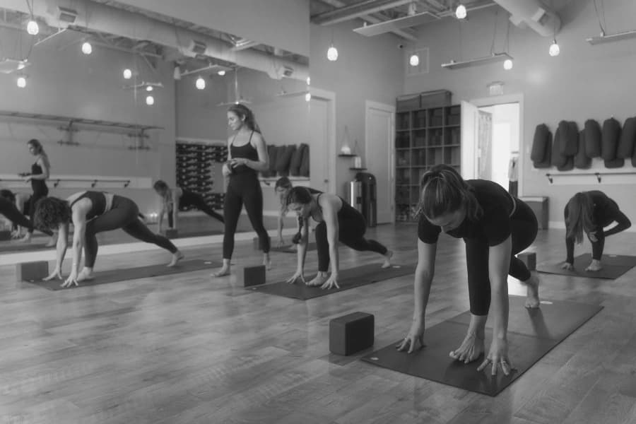 MYST 30A Yoga instructors teaching a class in the studio